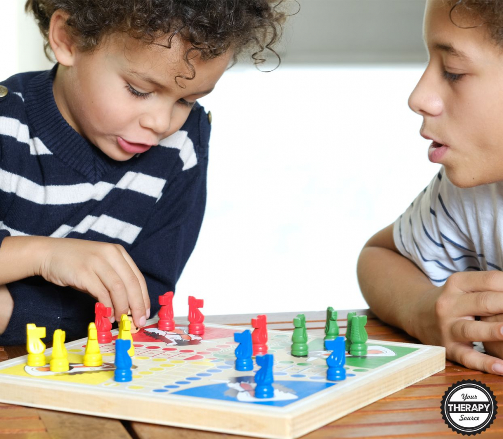 young people playing board games